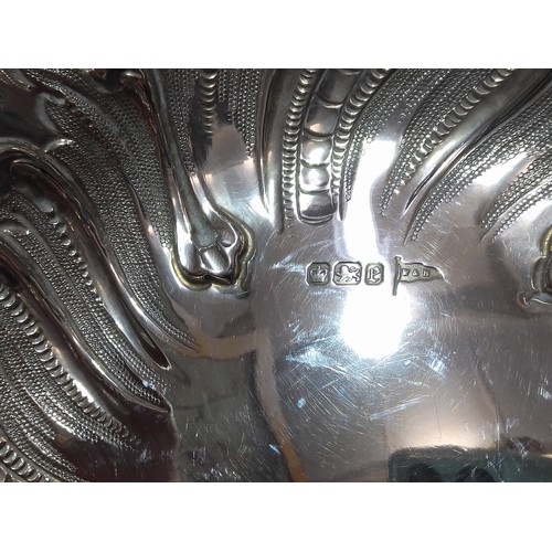 407 - A late Victorian repousse silver bowl, Walker & Hall, Sheffield 1897, diameter27cm, weight 13.4ozt.