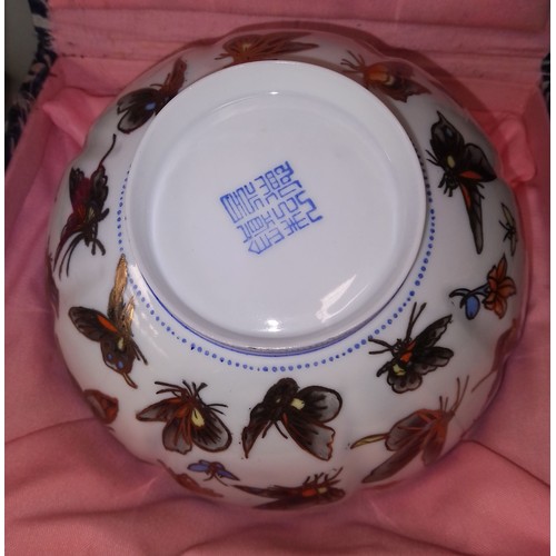 451 - Two Japanese ginger jars together with a boxed Japanese ceramic bowl decorated with butterflies