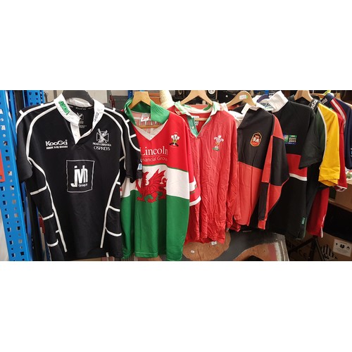 396 - Three boxes of assorted rugby, cricket and other sporting jerseys.