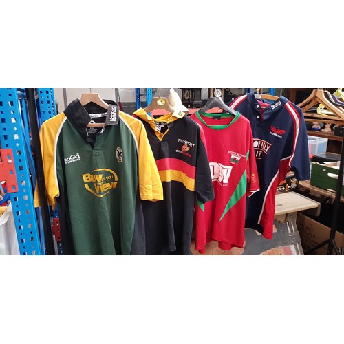 396 - Three boxes of assorted rugby, cricket and other sporting jerseys.