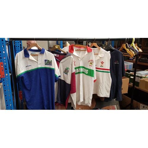 396 - Three boxes of assorted rugby, cricket and other sporting jerseys.