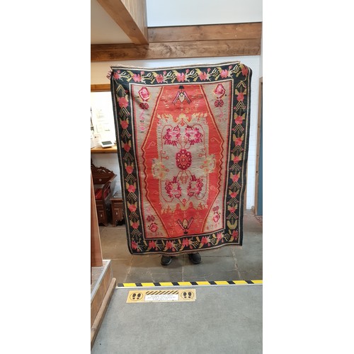 857 - A vintage Turkish Kilim wool carpet dated 1934, geometric design, 203cm x 137cm (approx).