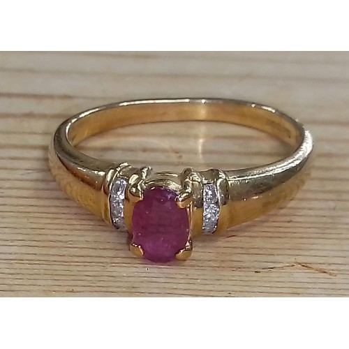 484 - A ruby and diamond ring, international convention marks, gross weight 2.6g.