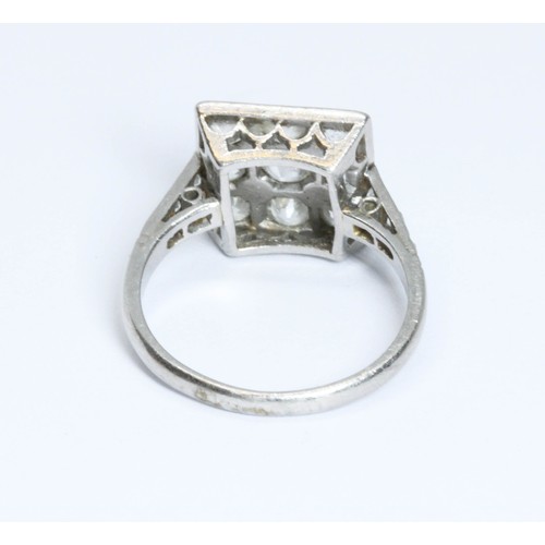 486 - An antique diamond cluster ring, nine pave set old European cut diamonds set in a square cluster mea... 