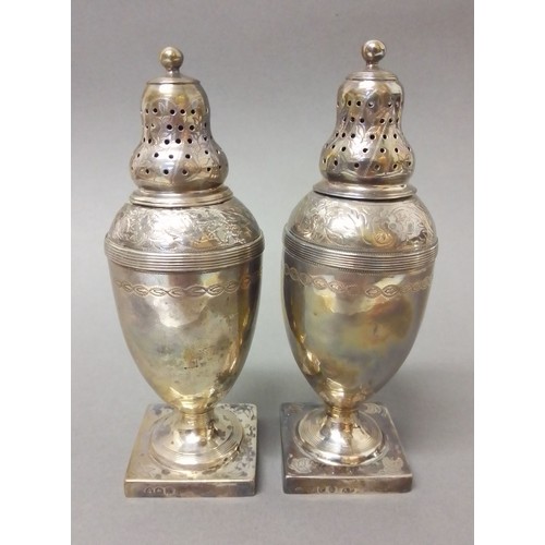 524 - A matched pair of George III silver pepper pots, one hallmarked for Andrew Fogelberg, London 1810, t... 