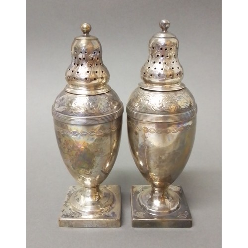 524 - A matched pair of George III silver pepper pots, one hallmarked for Andrew Fogelberg, London 1810, t... 