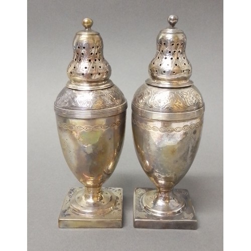 524 - A matched pair of George III silver pepper pots, one hallmarked for Andrew Fogelberg, London 1810, t... 