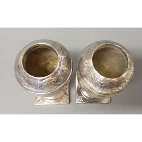 524 - A matched pair of George III silver pepper pots, one hallmarked for Andrew Fogelberg, London 1810, t... 