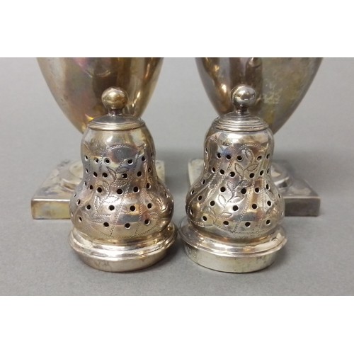 524 - A matched pair of George III silver pepper pots, one hallmarked for Andrew Fogelberg, London 1810, t... 