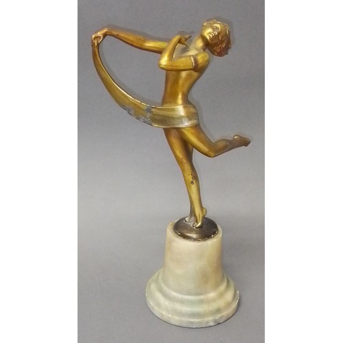 536 - An Art Deco bronze finished spelter figure on alabaster base, height 27cm.