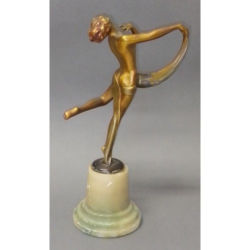 536 - An Art Deco bronze finished spelter figure on alabaster base, height 27cm.