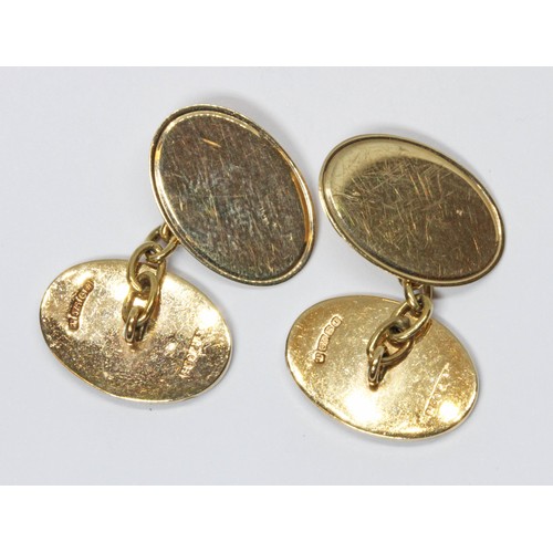 512 - A pair of hallmarked 9ct gold and enamel Masonic cufflinks, gross weight 7.2g.