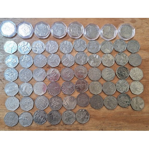 563 - A group of 64 assorted collectable 50p coins.