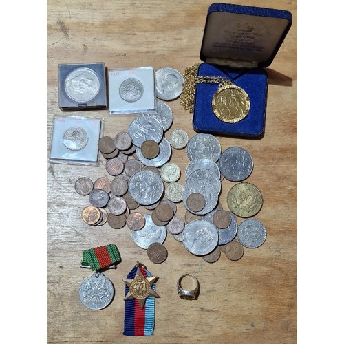 565 - A tub of assorted GB coins, medals & a silver ring to include commemorative crowns (1 gold plated & ... 