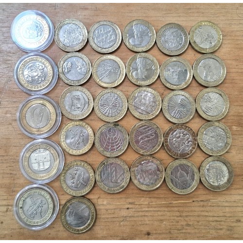 564 - A group of 31 assorted collectable £2 coins.