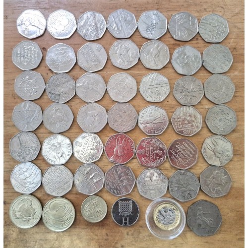 551 - A group of 48 assorted collectable modern coins, mainly 50ps.