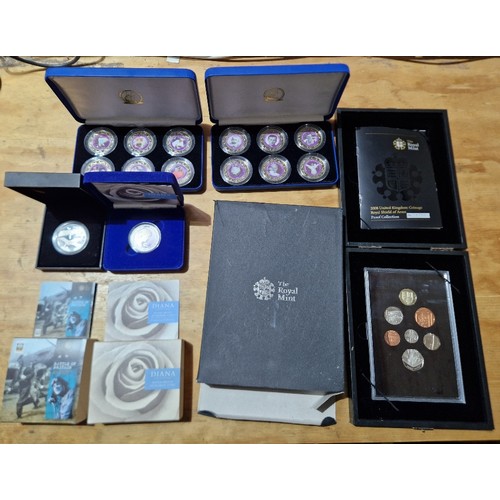 588 - A group of silver coins & coin sets to include a Royal Mint 2008 proof collection, Diana silver proo... 