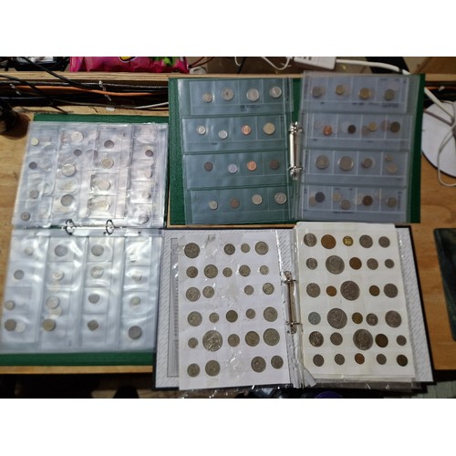 581 - Three files of assorted GB & world coins.