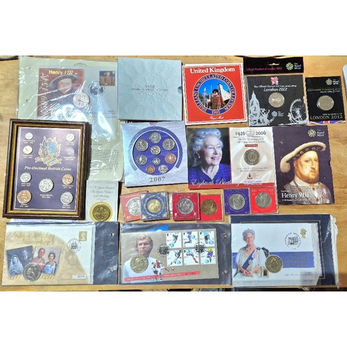 589 - A collection of assorted GB coin sets, coin covers & commemorative coins etc.