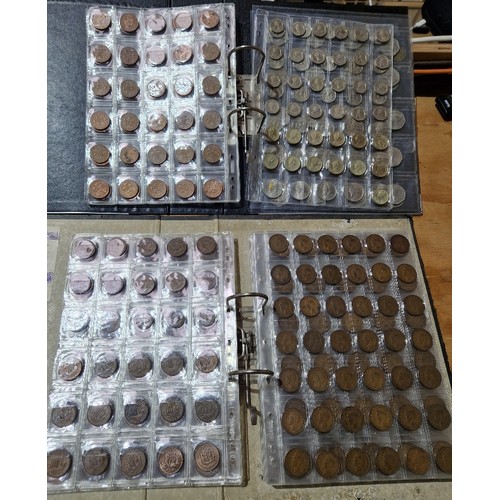 582 - Two files of assorted GB coins to include pennies, half pennies, farthings & 50ps, £1 & 20ps etc.