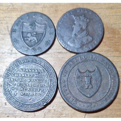 602 - A group of four copper tokens comprising an 1811 worcester city and county 1 penny, 1811 newark 1 pe... 