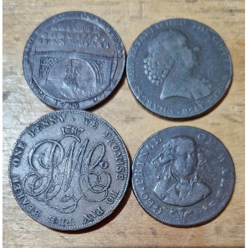 601 - A group of four copper 1/2 penny tokens comprising an 1792 iron bridge coalbrook dale, 1787 anglesey... 