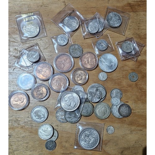 605 - A tray of assorted coins to include english & australian 1937 crowns, foreign silver coins inc. 1922... 