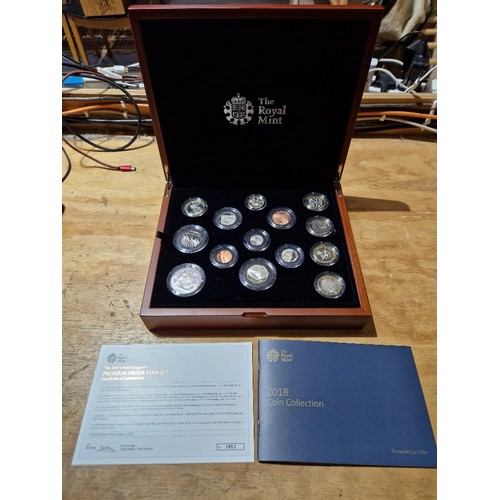 597 - A Royal Mint United Kingdom 2018 Premium Proof Coin set, in original wooden display box, with certif... 