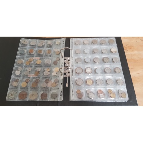 583 - Two files of assorted GB & world coins to include silver coins & threepences etc.