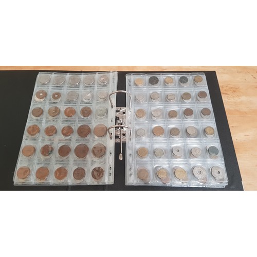 583 - Two files of assorted GB & world coins to include silver coins & threepences etc.