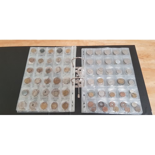 583 - Two files of assorted GB & world coins to include silver coins & threepences etc.