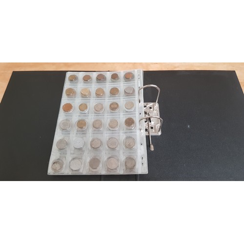 583 - Two files of assorted GB & world coins to include silver coins & threepences etc.