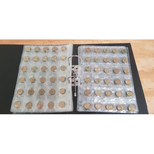 583 - Two files of assorted GB & world coins to include silver coins & threepences etc.