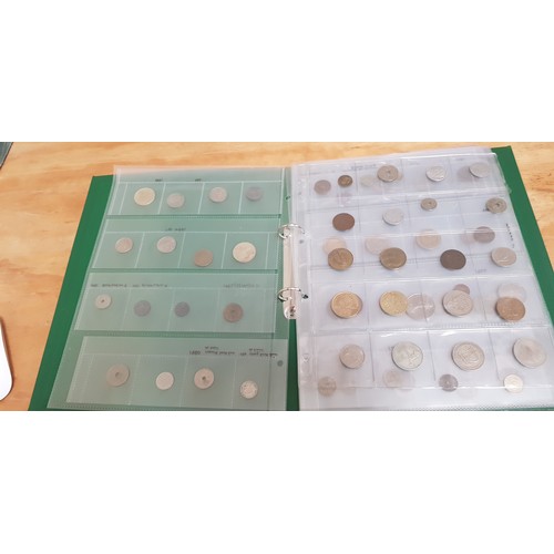 581 - Three files of assorted GB & world coins.