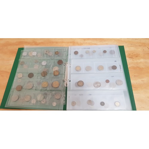 581 - Three files of assorted GB & world coins.