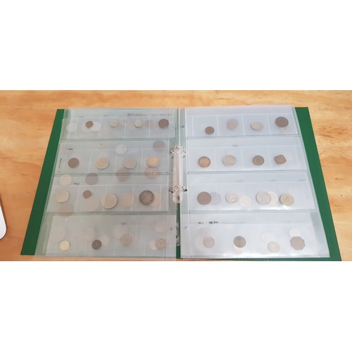 581 - Three files of assorted GB & world coins.