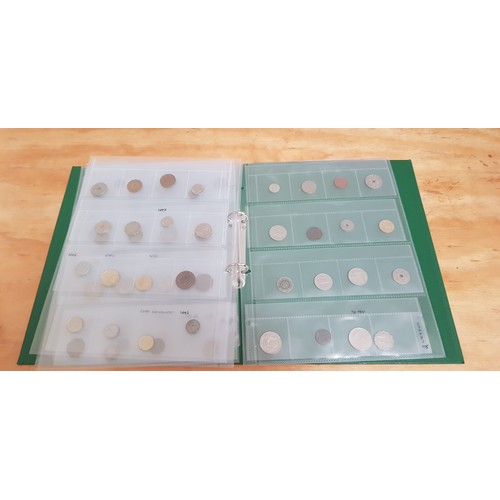 581 - Three files of assorted GB & world coins.