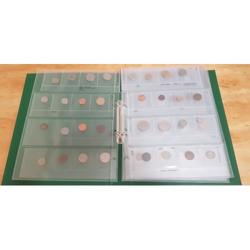 581 - Three files of assorted GB & world coins.