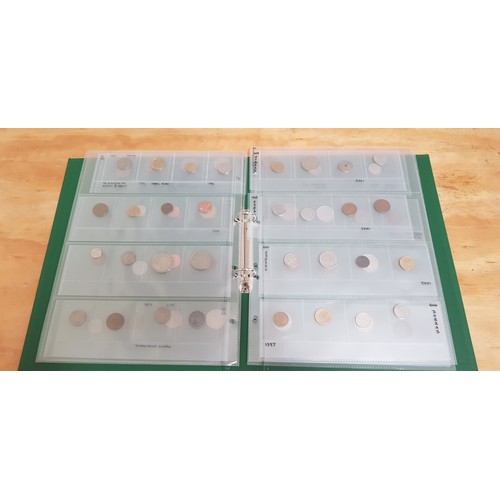 581 - Three files of assorted GB & world coins.