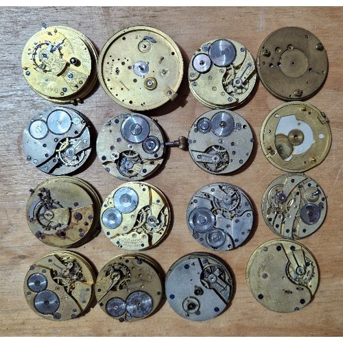 274 - A box of assorted pocket watch movements and dials.