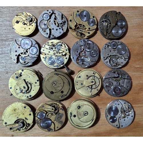 274 - A box of assorted pocket watch movements and dials.