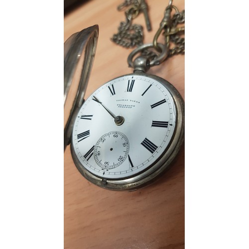 243 - Two hallmarked silver pocket watches with Albert chains.