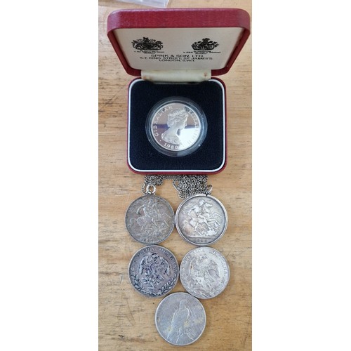 608 - A group of six assorted silver coins comprising of 2 x crowns (1893 (mounted) & 1897), 2 x Mexican 8... 