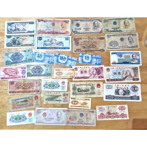 575 - A group of assorted world banknotes.