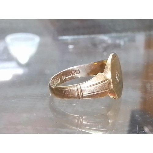 10 - A hallmarked 9ct gold diamond signet ring, gross weight 5.1g, size T.