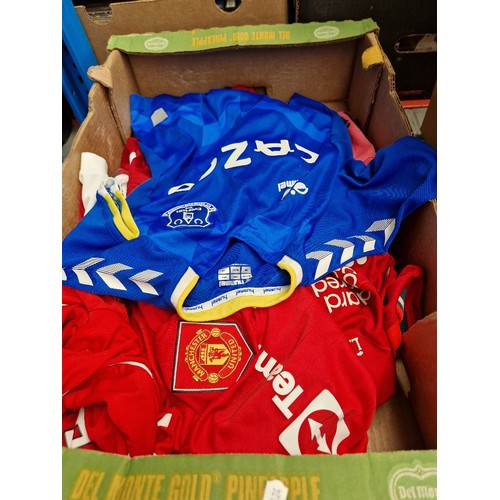 193 - A box of football shirts