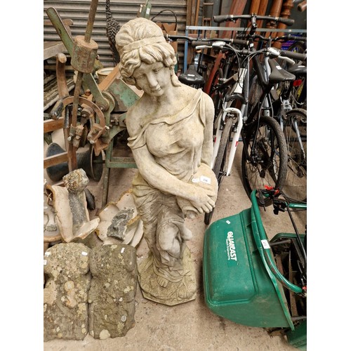 220 - Stoneware garden figure modelled as a classical lady, approx. 47