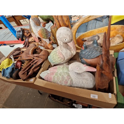 232 - Two boxes of mainly carved wooden animal figures.