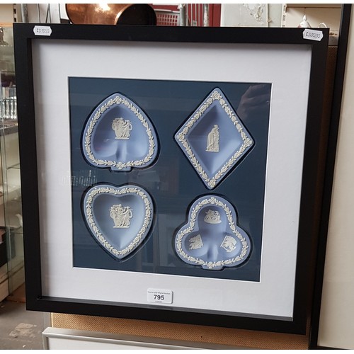 795 - A framed display of blue and white Wedgwood jasperware.