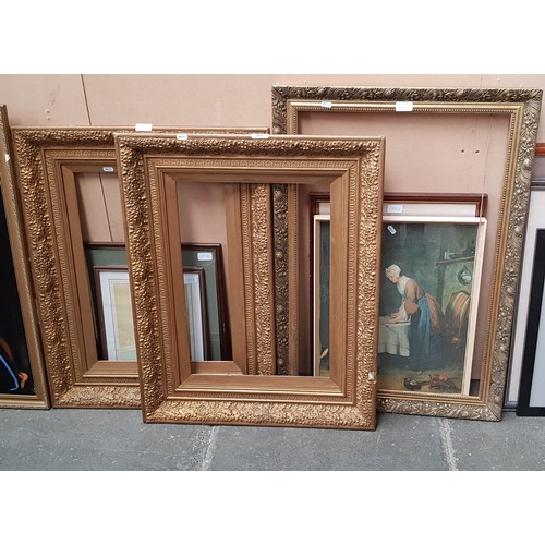 808 - Three gilt picture frames together with four framed prints.